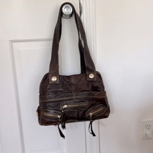 Gustto chocolate brown leather handbag.
